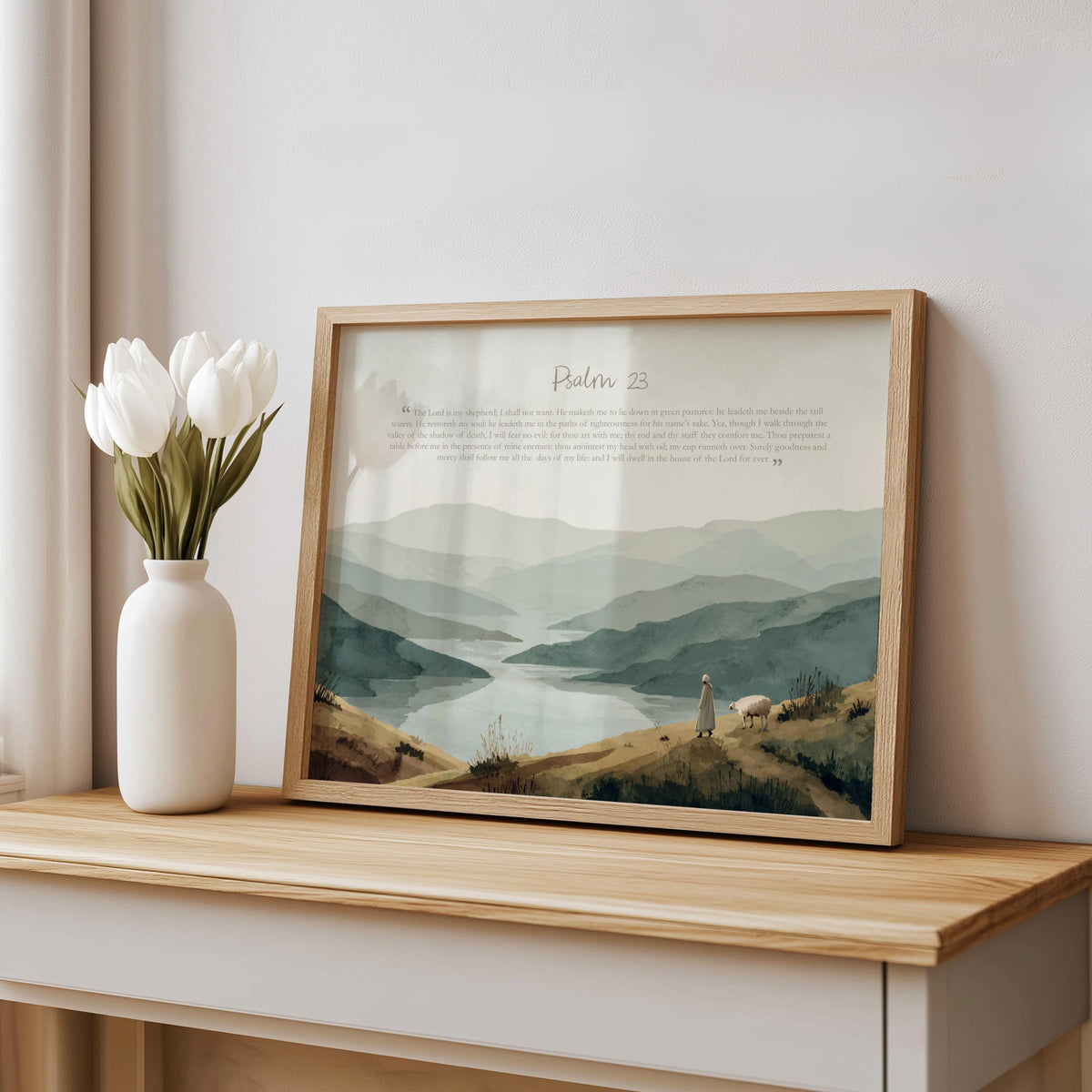 Leaning frame on a wooden bench with vase, good shepherd watercolor art in olive and dusty blue, Psalm 23 print
