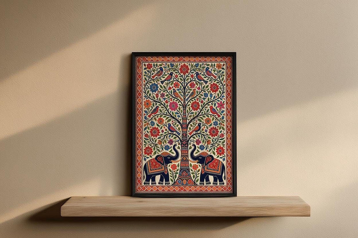 A framed picture of two elephants standing next to a tree with a colorful, intricate design on the trunk and branches.
