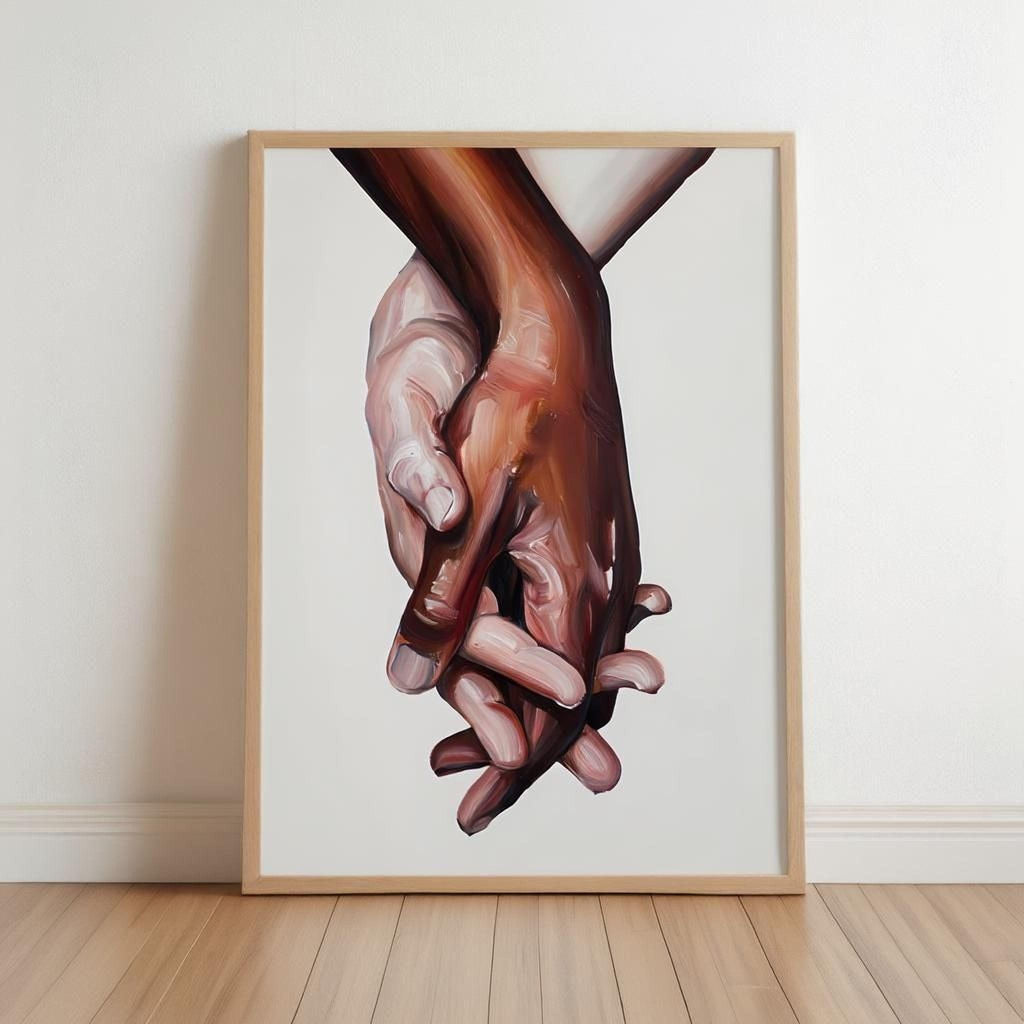 The image is a framed painting depicting two hands clasped together.