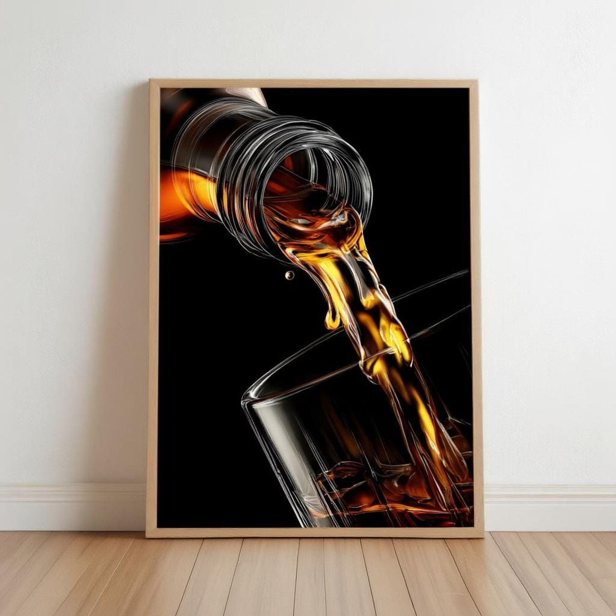 A framed image depicting a glass of amber-colored liquid, possibly whiskey, being poured into it.