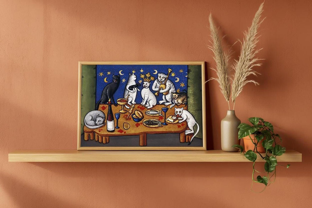a framed painting of cats sitting around a table with food, including a wine glass, a bowl, and a vase. The painting is displayed on a wooden shelf, and there is a potted plant and a vase with a plant on the shelf as well.