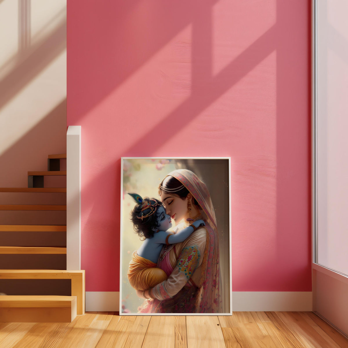 a framed painting of a woman holding a child, with a pink wall in the background.
