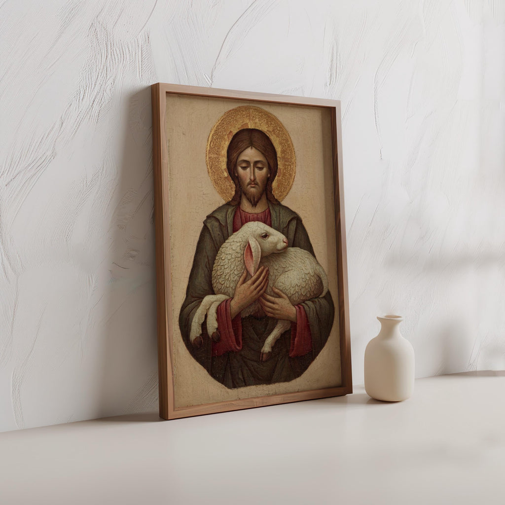 a framed painting of Jesus Christ holding a lamb, placed on a white surface next to a small white vase.