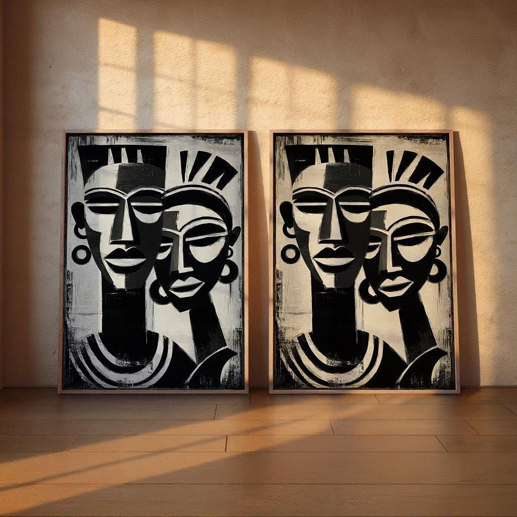 two large black and white paintings of abstract human faces, displayed on a wall.