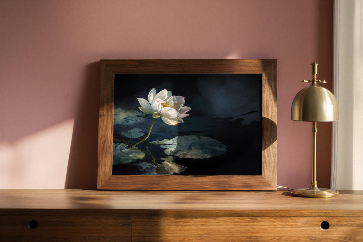 Small framed white lotus wall art on a blush pink wall with brass lamp, intimate water lily wall art for yoga room decor