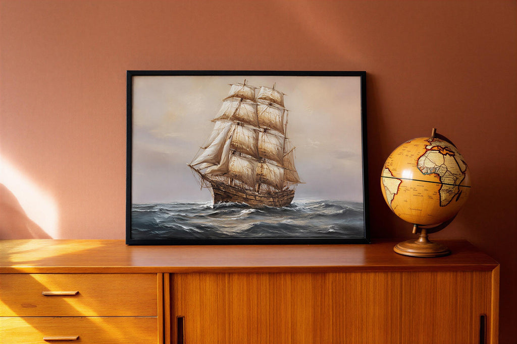 Antique tall ship canvas for nautical wall art; billowing sails on a moody navy blue seascape framed in ornate gold.