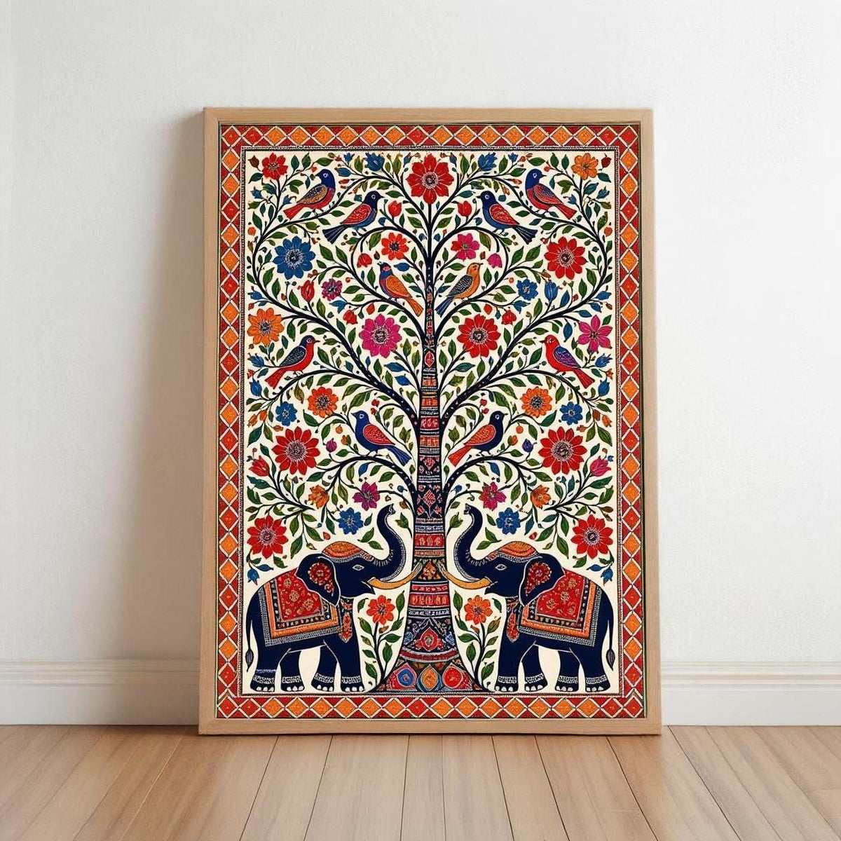 The image is a framed artwork depicting a tree with various colorful flowers and birds, including two elephants. The elephants are adorned with intricate patterns and designs, adding to the overall visual appeal of the scene.