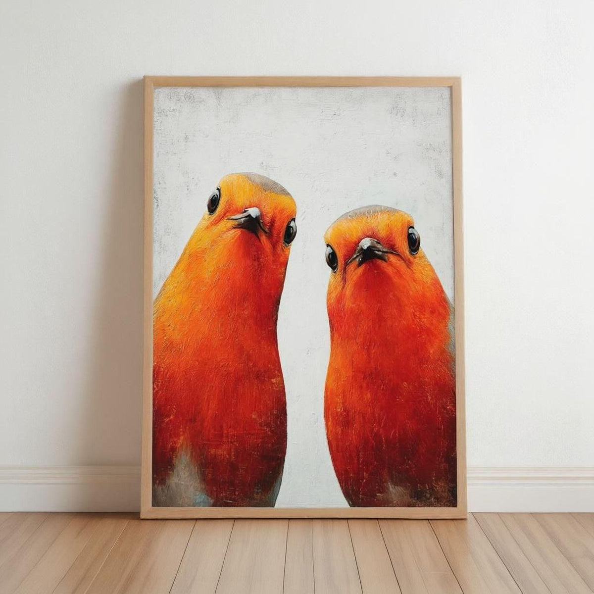 two vibrant red birds with contrasting beaks, standing side by side against a plain white background.