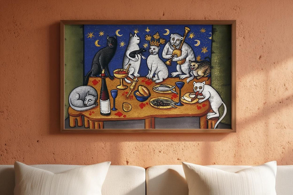 The image is a framed painting depicting a whimsical scene of cats gathered around a table, with various objects such as wine glasses, bowls, and a cake.