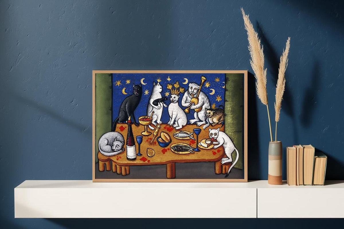 The image is a framed painting depicting a whimsical scene of cats gathered around a table, with various objects such as wine glasses, plates, and a vase.