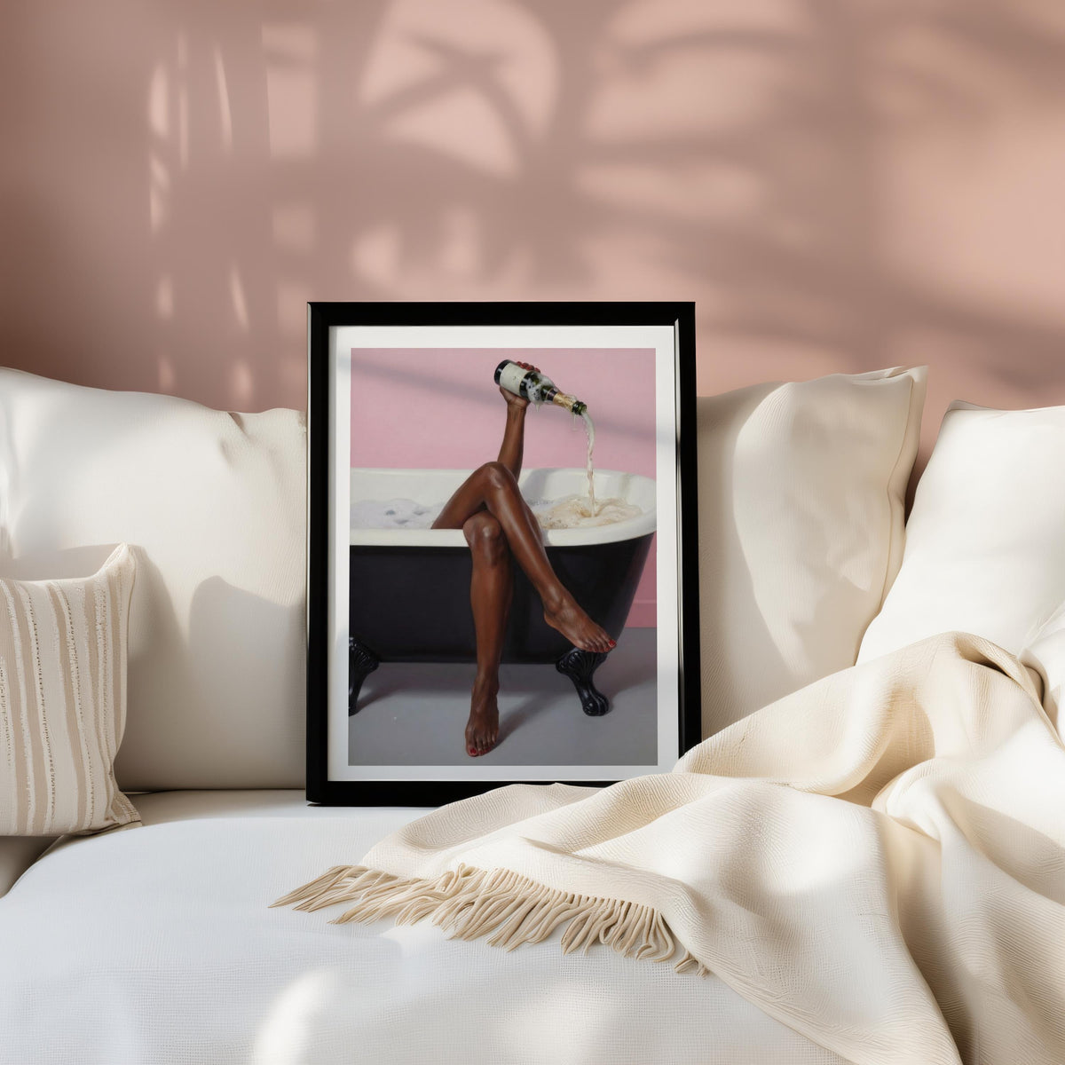Small framed print on couch cushions, black woman bathroom wall art, feminine bathtub wall decor in a cozy room