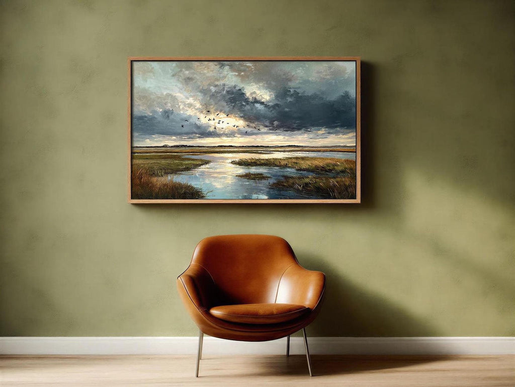 a large landscape painting hanging on a green wall above a brown leather armchair.