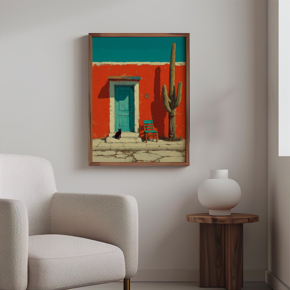 Hung above a boucle chair and wood side table, mexican architecture art print, vibrant desert landscape print on display