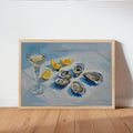Oyster, lemons & martini glass still life on a blue table; Fauvism-style Mediterranean oil wall art.