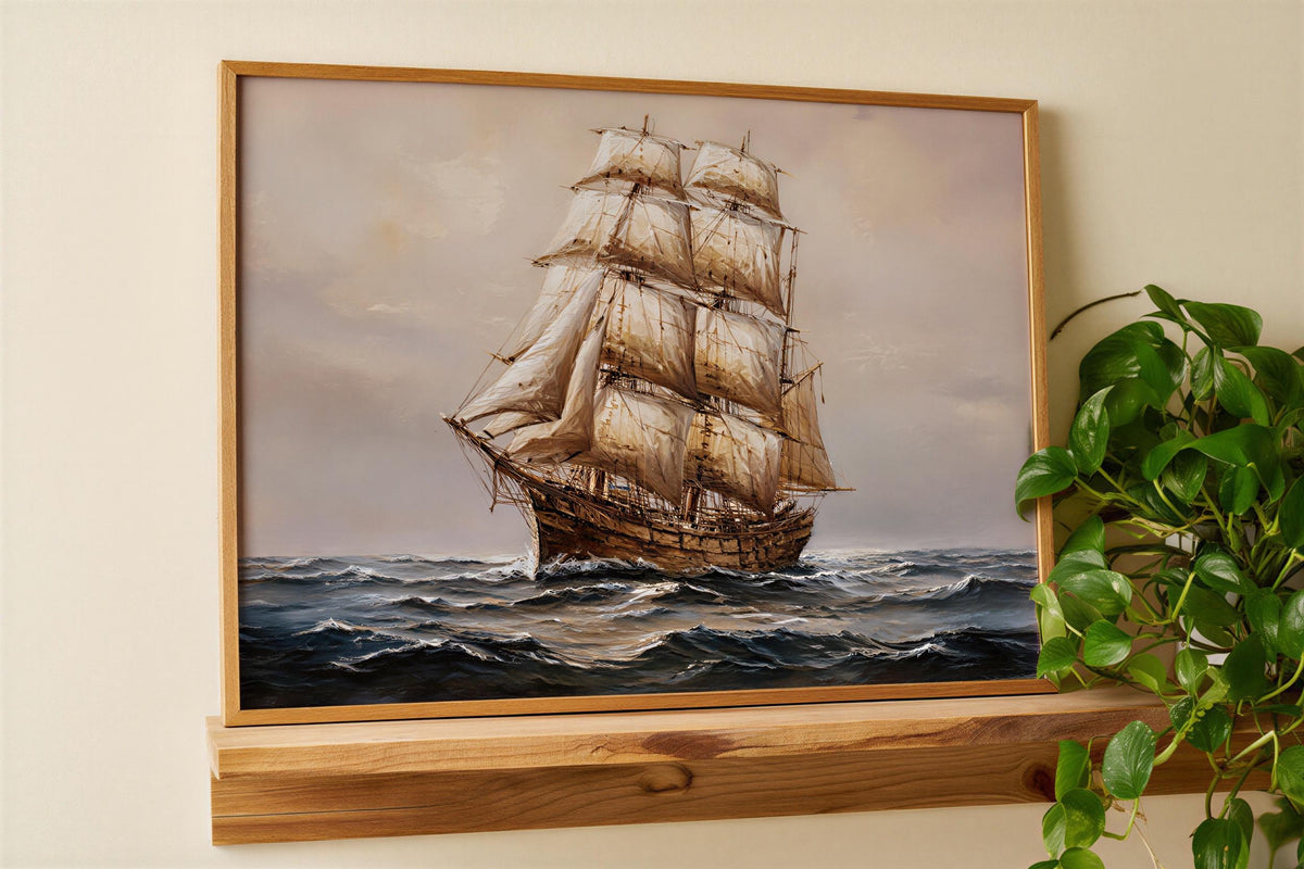 Antique tall ship canvas for nautical wall art; billowing sails on a moody navy blue seascape framed in ornate gold.