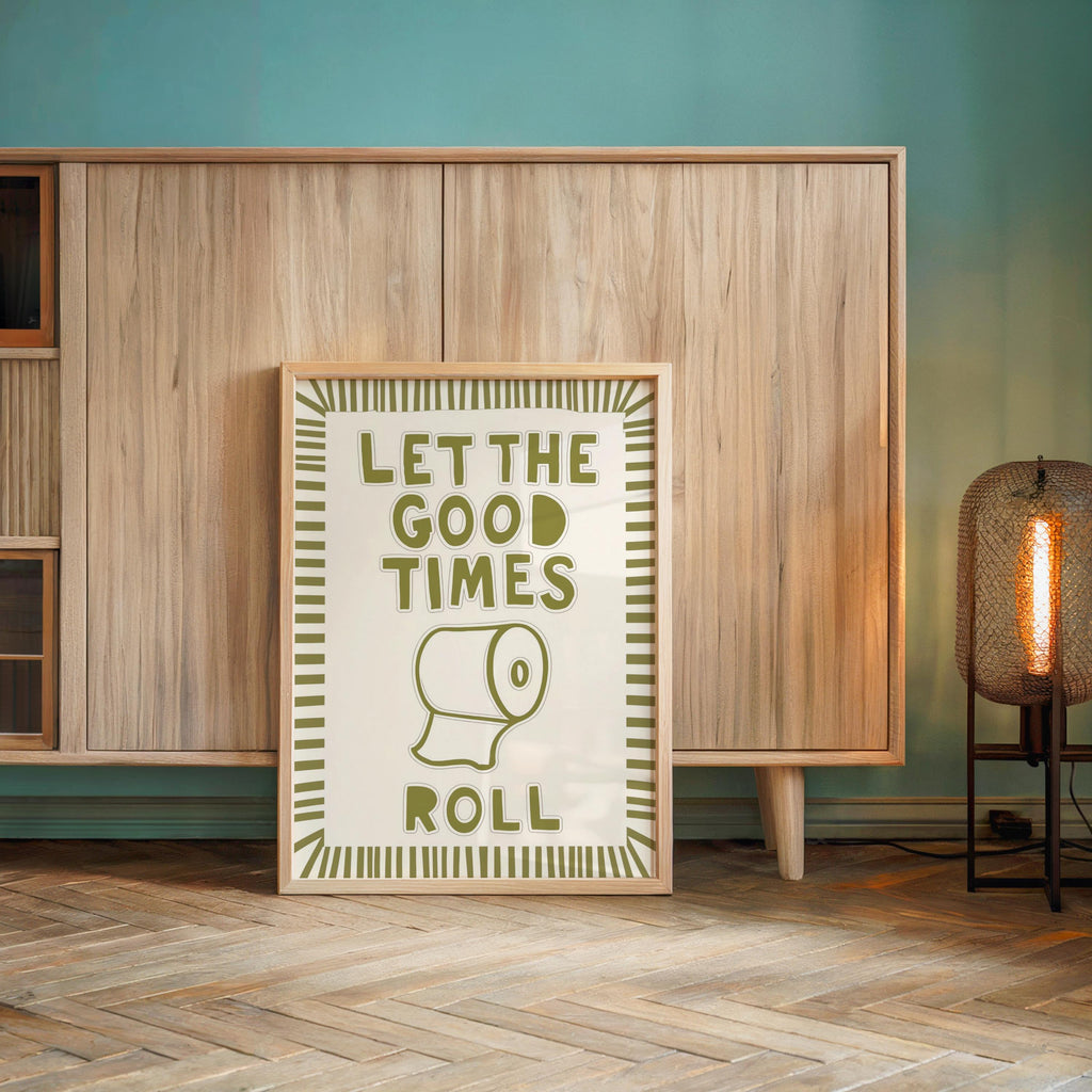 Olive green poster against cabinet, natural light highlights striped border, restroom wall art with retro poster feel