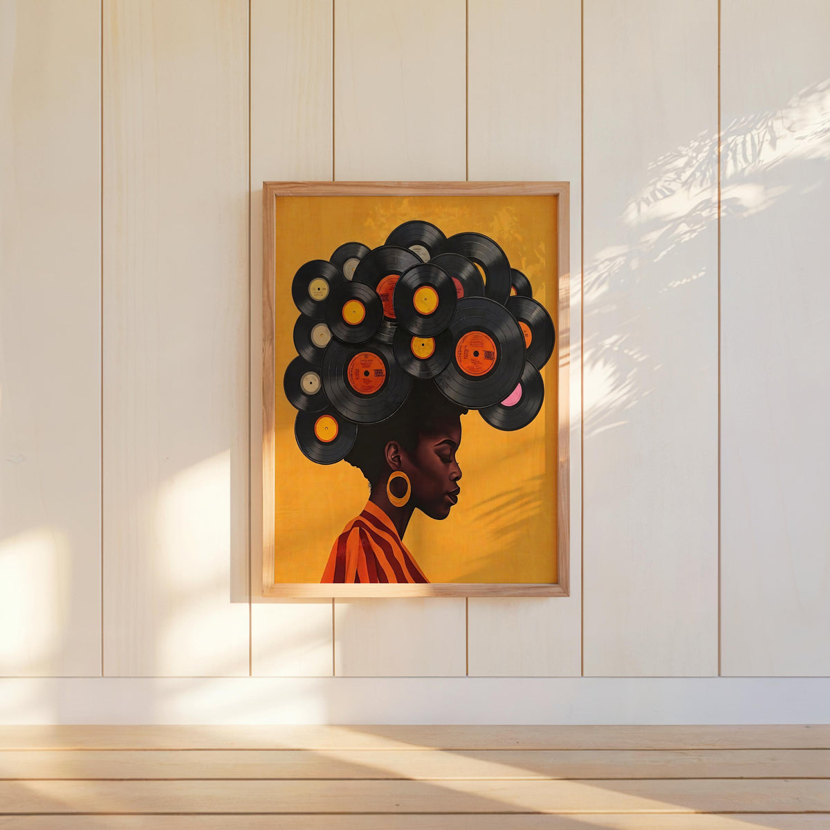 Single framed yellow variant hung on paneled wall, strong profile and vinyl-record afro, black woman vinyl record wall art