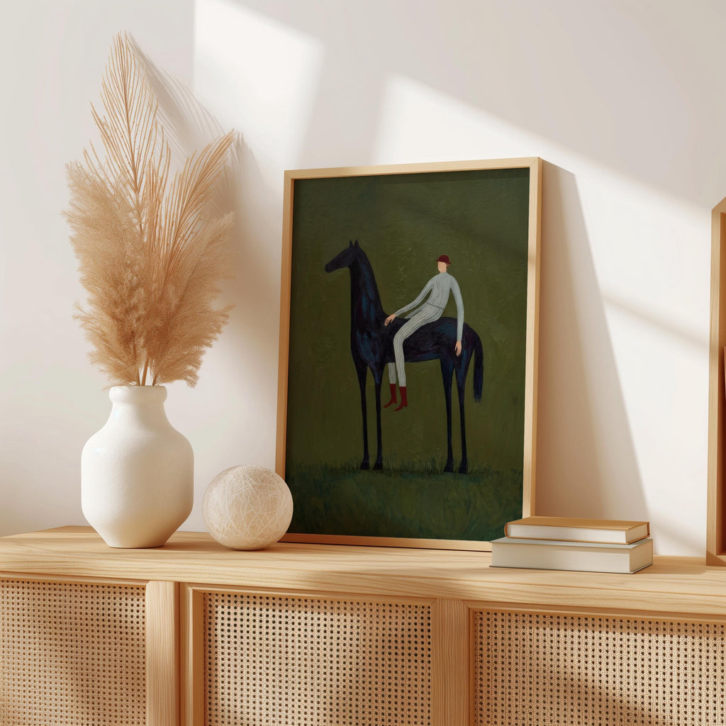 Framed horse print on wooden console, pampas grass and vase accompany the vintage minimalist equestrian vibe.