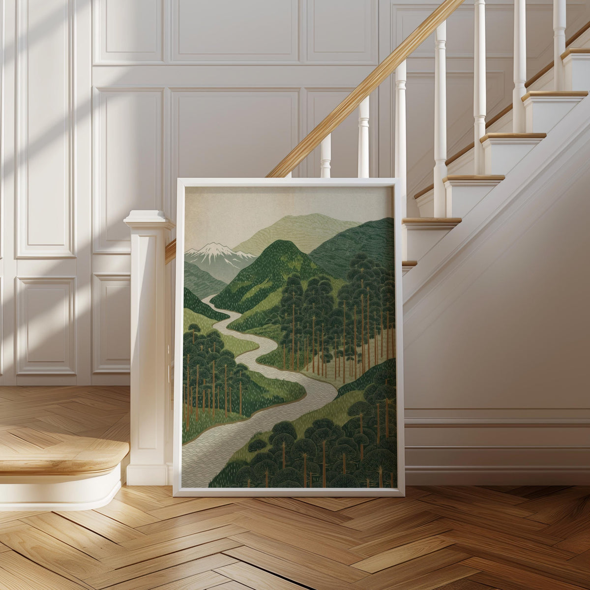 Framed green hills poster placed by white staircase, textured herringbone floor complements earthy tones