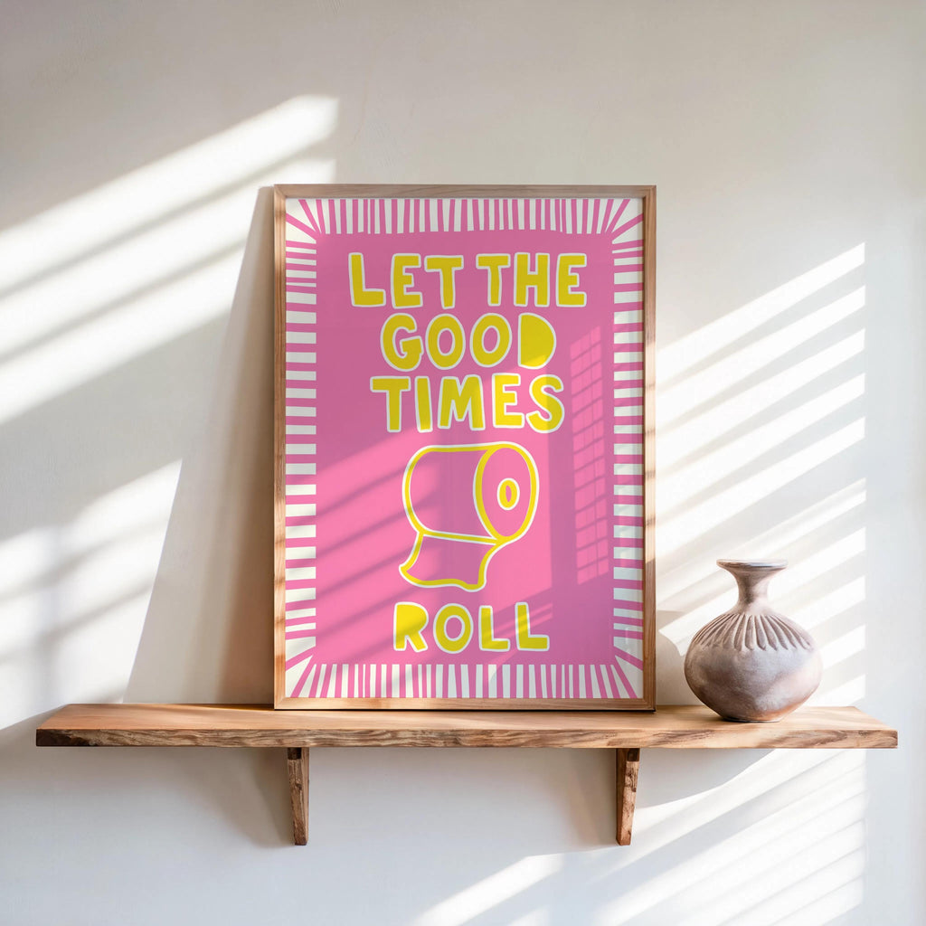Bright pink let the good times roll print on wood shelf, colorful bathroom print with playful retro typography