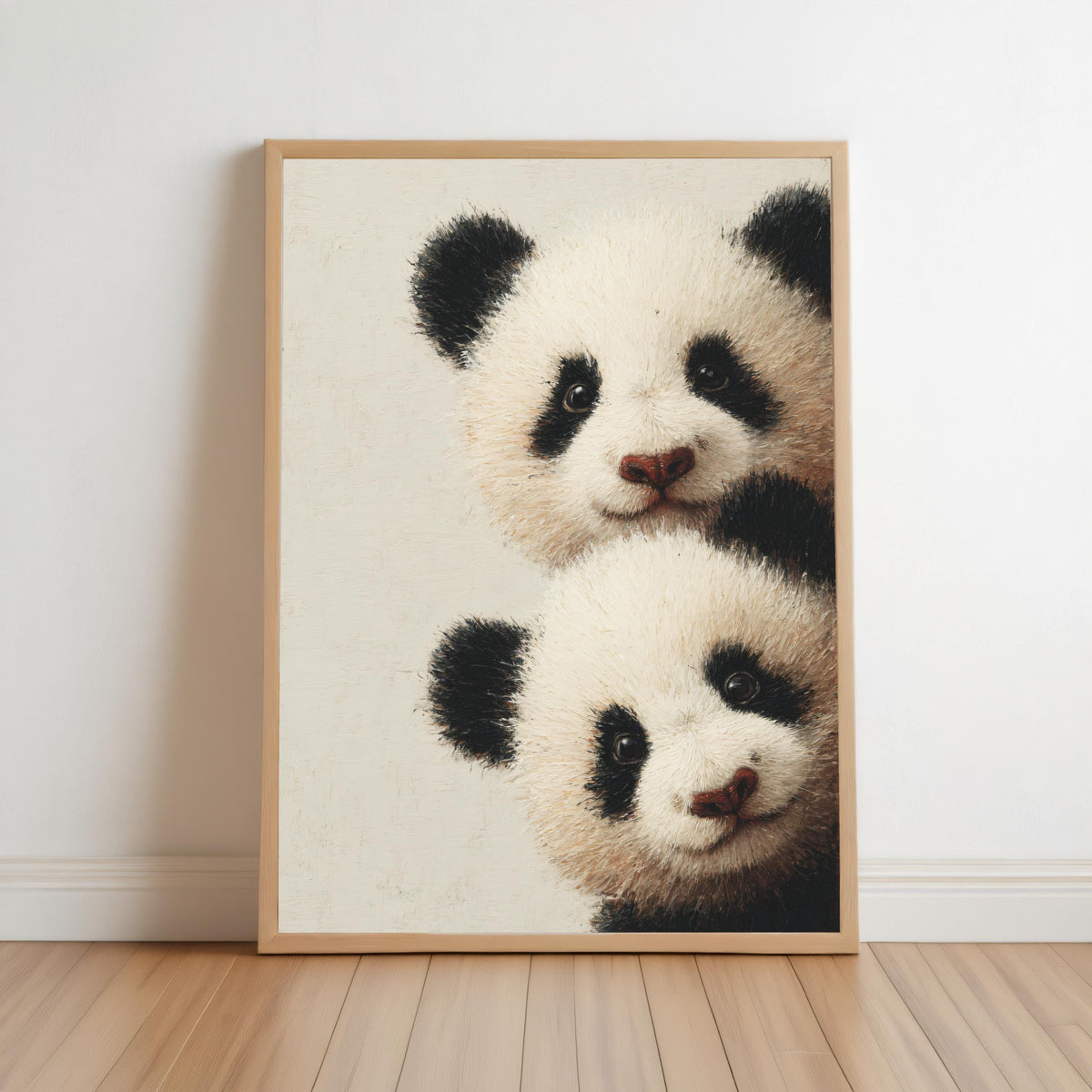 Baby pandas wall art: two giant panda cubs peeking from the edge in a light-wood framed print for baby panda nursery decor.