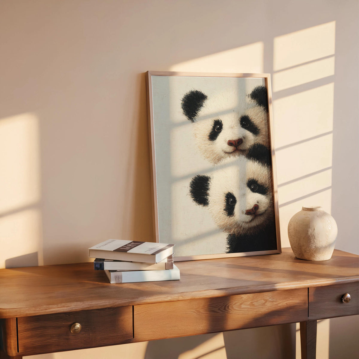 Baby pandas wall art: two giant panda cubs peeking from the edge in a light-wood framed print for baby panda nursery decor.