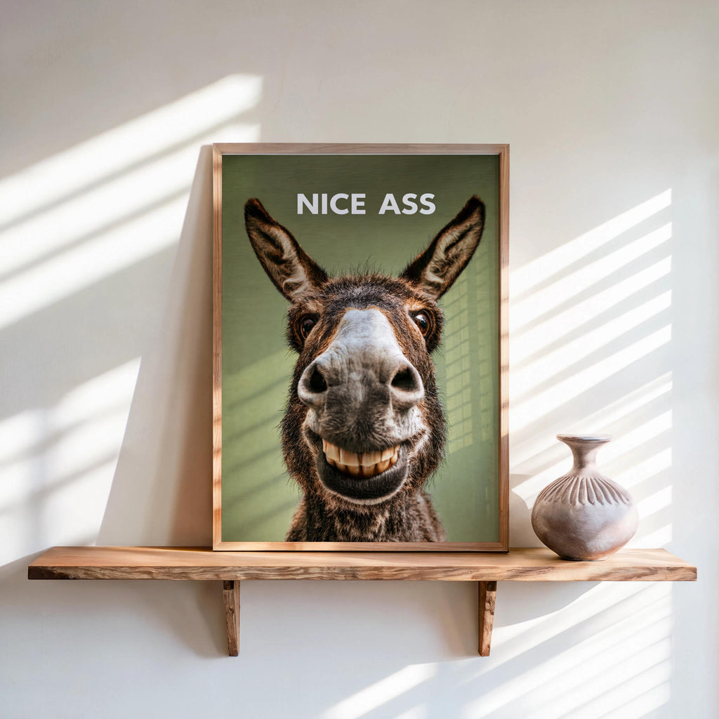 Olive green funny donkey bathroom sign on floating shelf, bold white NICE ASS headline, rustic poster look