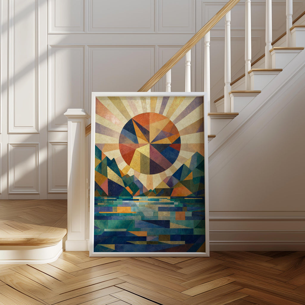 Leaning frame at the base of a staircase, sun and mountains wall decor with deep blues, teals, and sunset rays