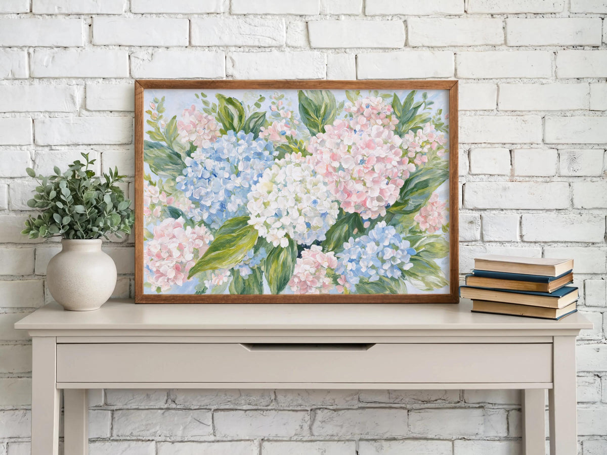 Hydrangea printable wall art above white brick mantel, small plant and stacked books, English country feel