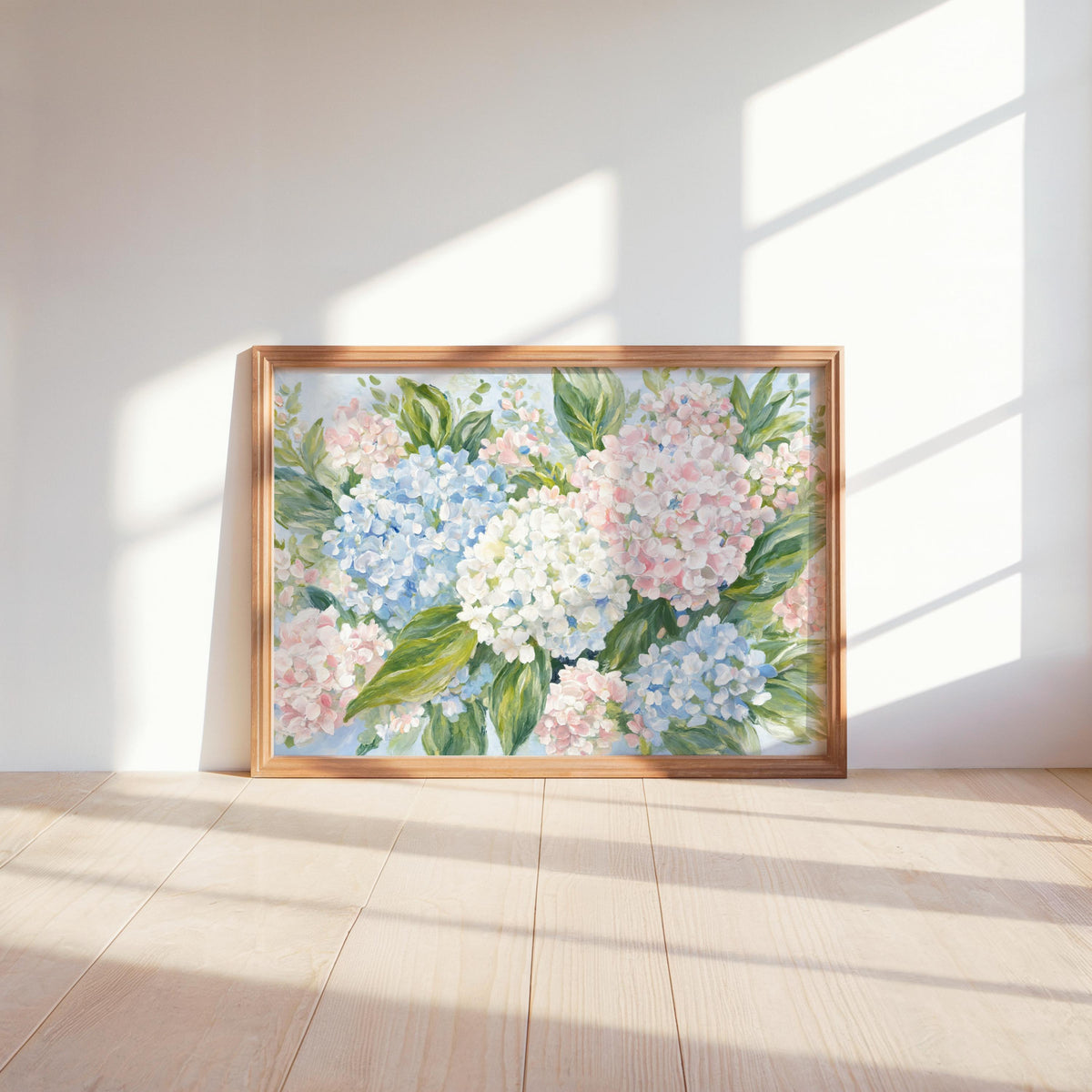 Impressionist flower art print leaning on sunlit floor, soft shadows accent painterly hydrangea clusters