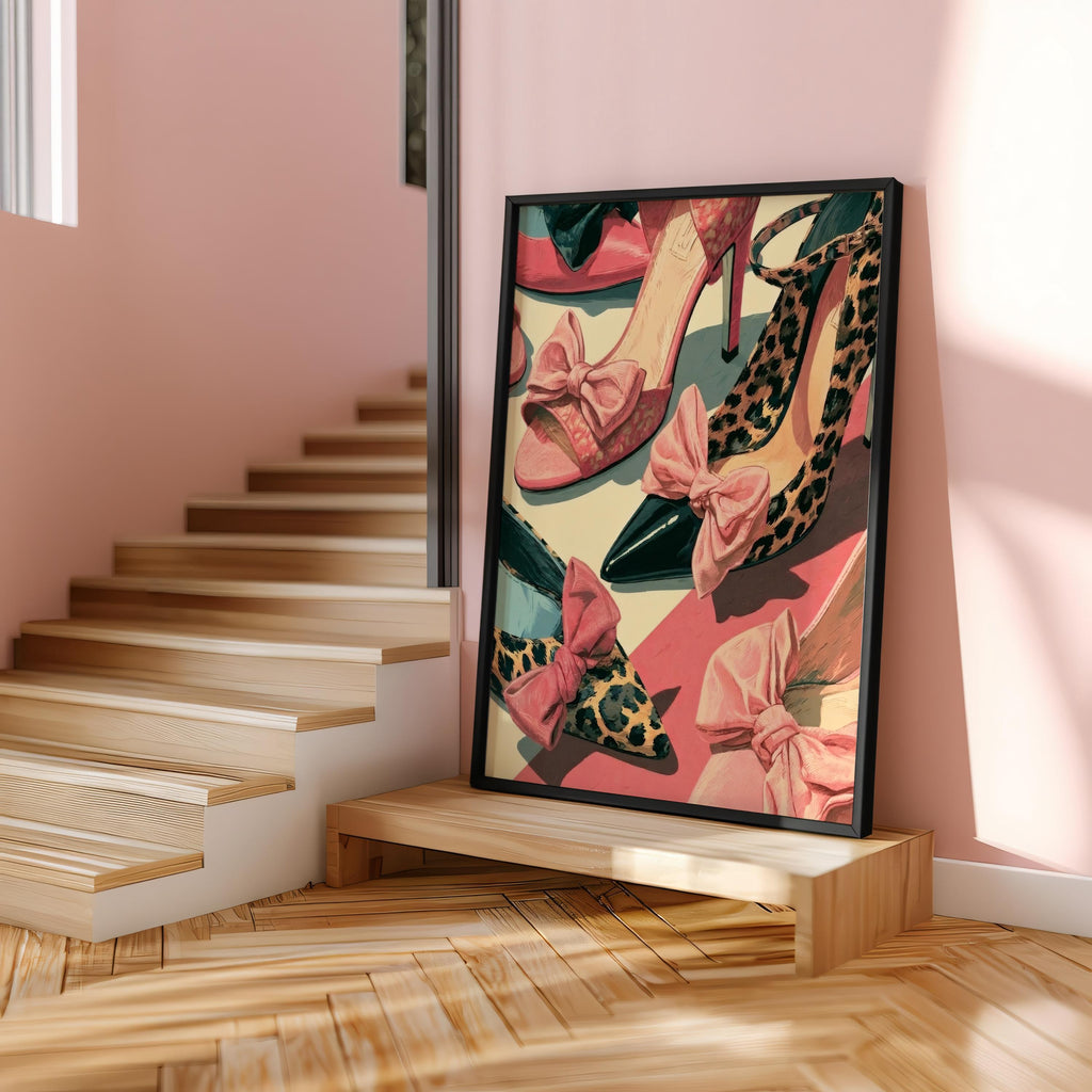 Shoe lover wall art on a stair landing, framed print with leopard and glossy black heels, soft pink stairwell styling