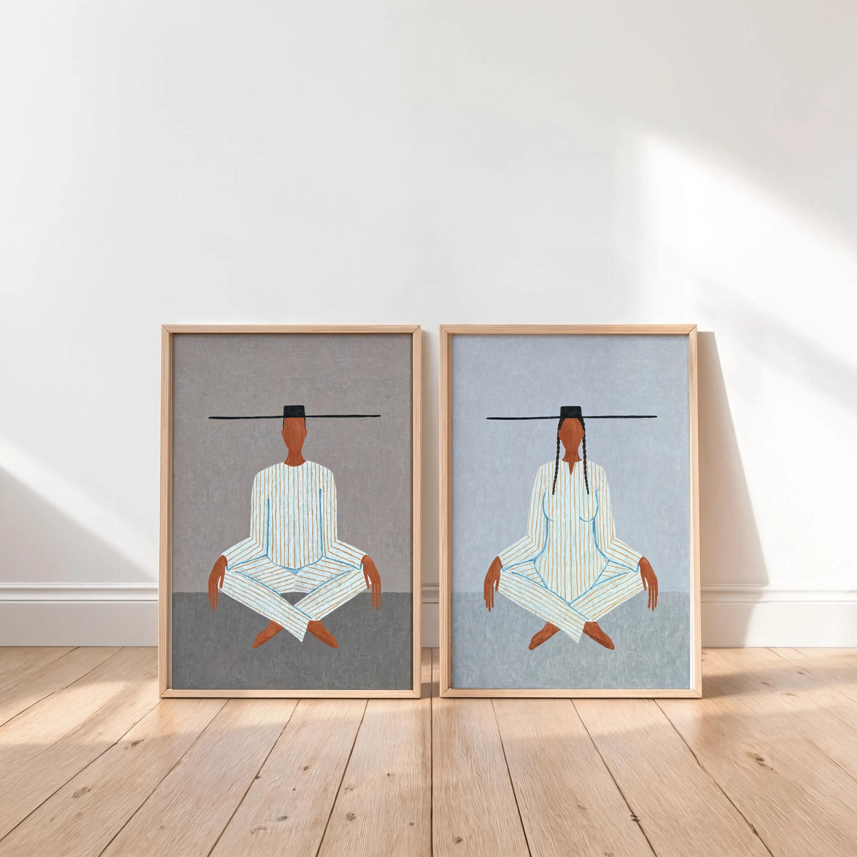 Twin light toned prints leaning on white wall, minimalist meditation print pair, yoga wall art with subtle textures