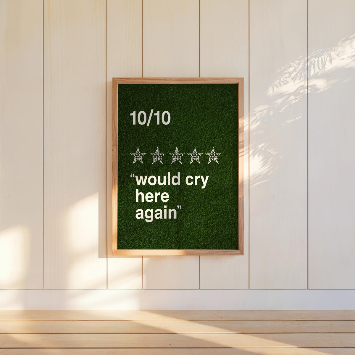 Deep green would cry here again print hung lower on wall, five-star motif visible, relatable funny wall art for friends