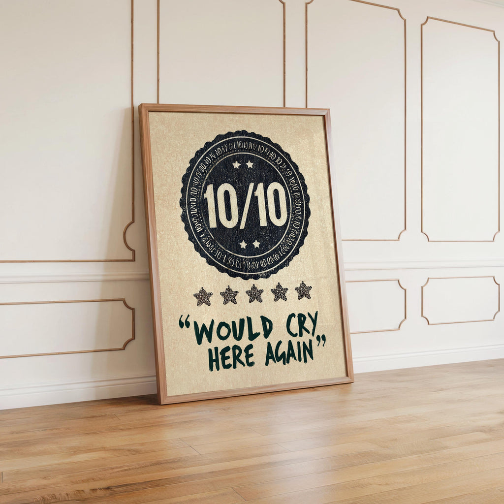 Navy would cry here again print leaning against paneled wall, soft side light, therapy office decor aesthetics