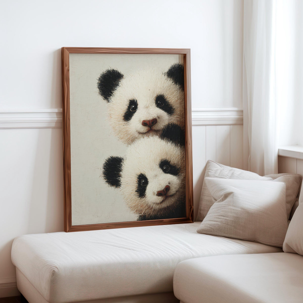 Baby pandas wall art: two giant panda cubs peeking from the edge in a light-wood framed print for baby panda nursery decor.