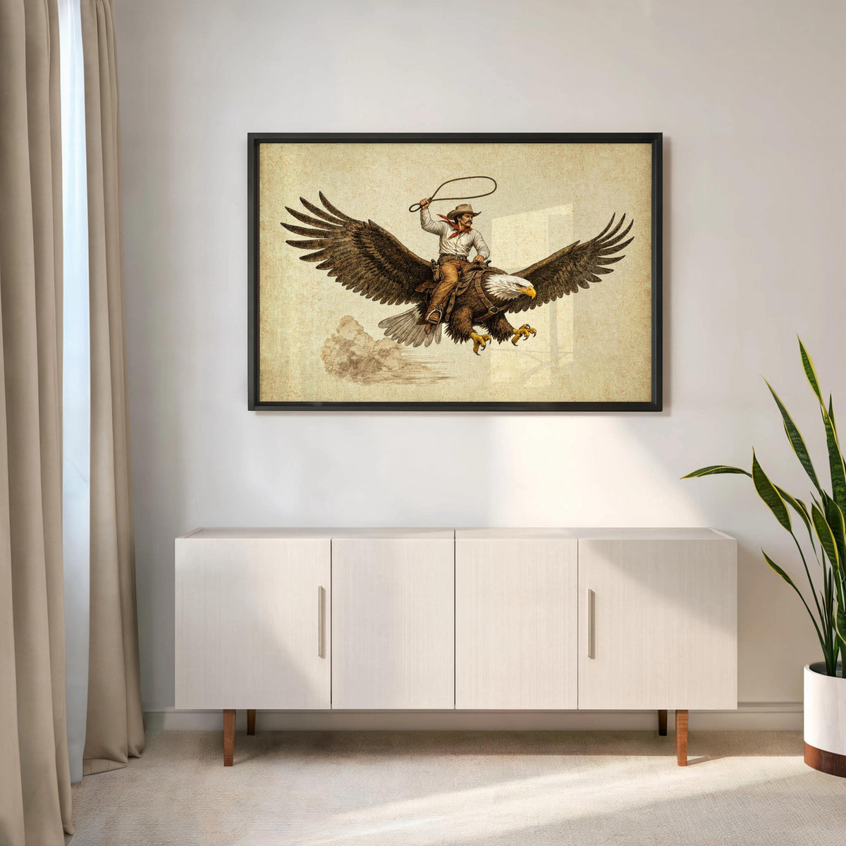 Framed vintage cowboy riding eagle wall art above console, muted browns, Western Americana styling