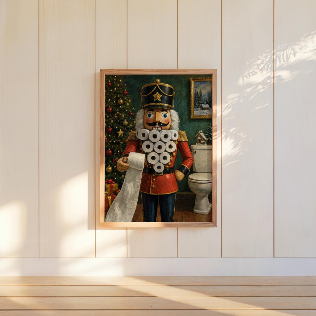Framed funny nutcracker bathroom print hung on a white wall, sunlight stripes accent the festive colors and gold.