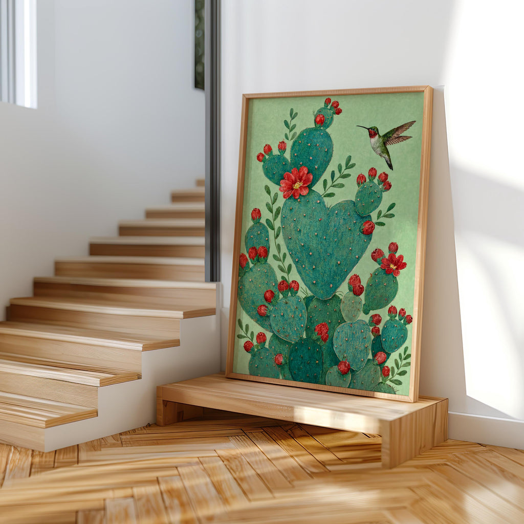 Close-up heart shaped cactus print beside stacked books, textured paper, Latina wall art mood and colors