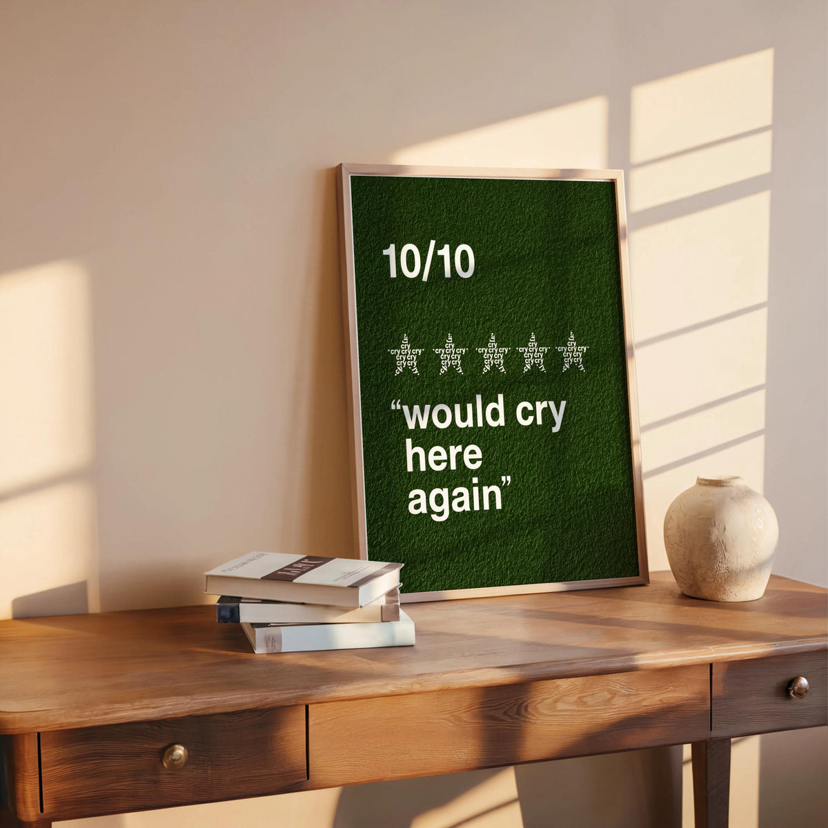Green would cry here again print propped on desk near books, textured retro background, therapist office wall decor idea