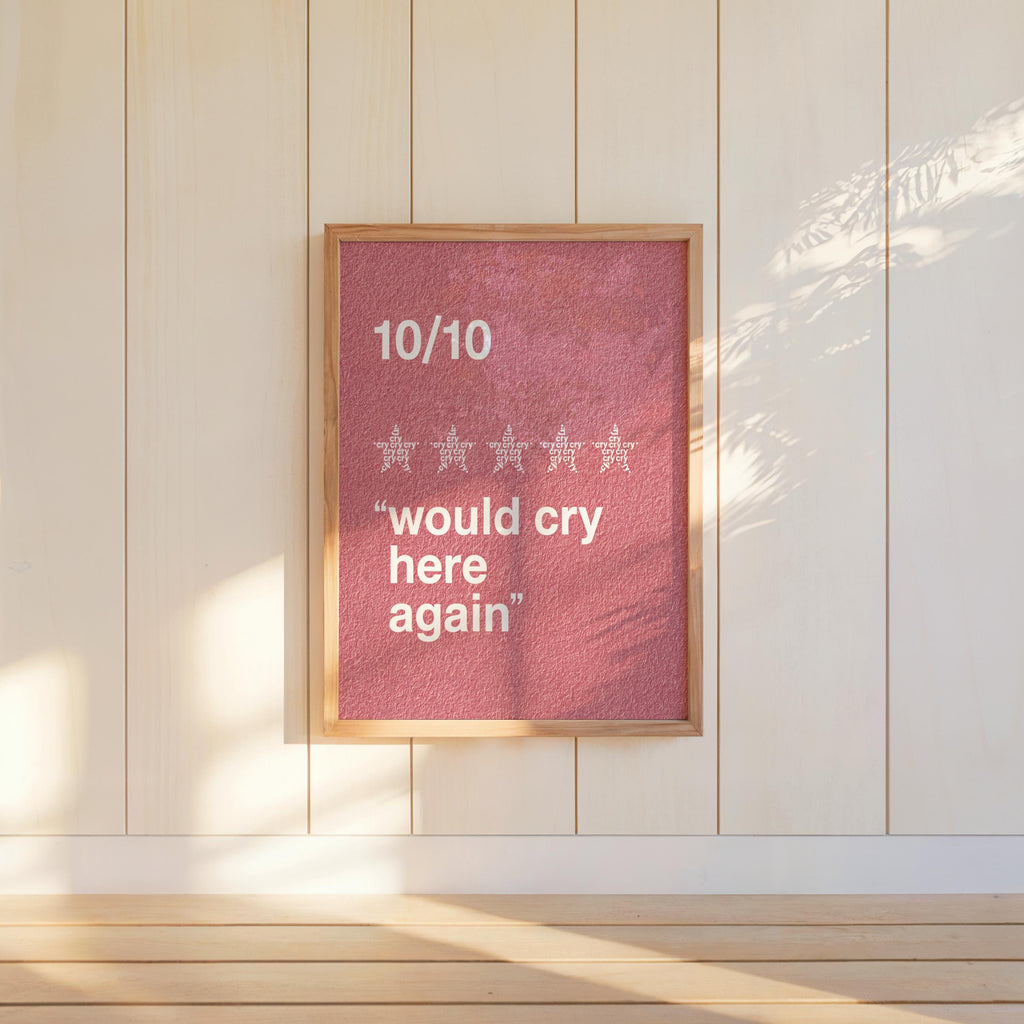 Centered pink would cry here again print on pale wall, compact framed-print style, minimalist quote wall art for gifting