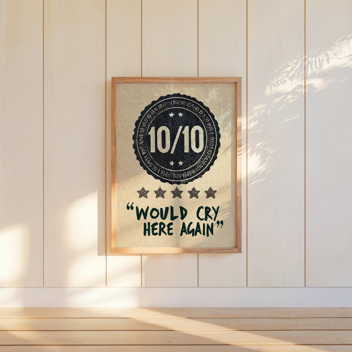 Navy would cry here again print tucked low on a ledge, cozy shadows, minimalist typography and distressed badge