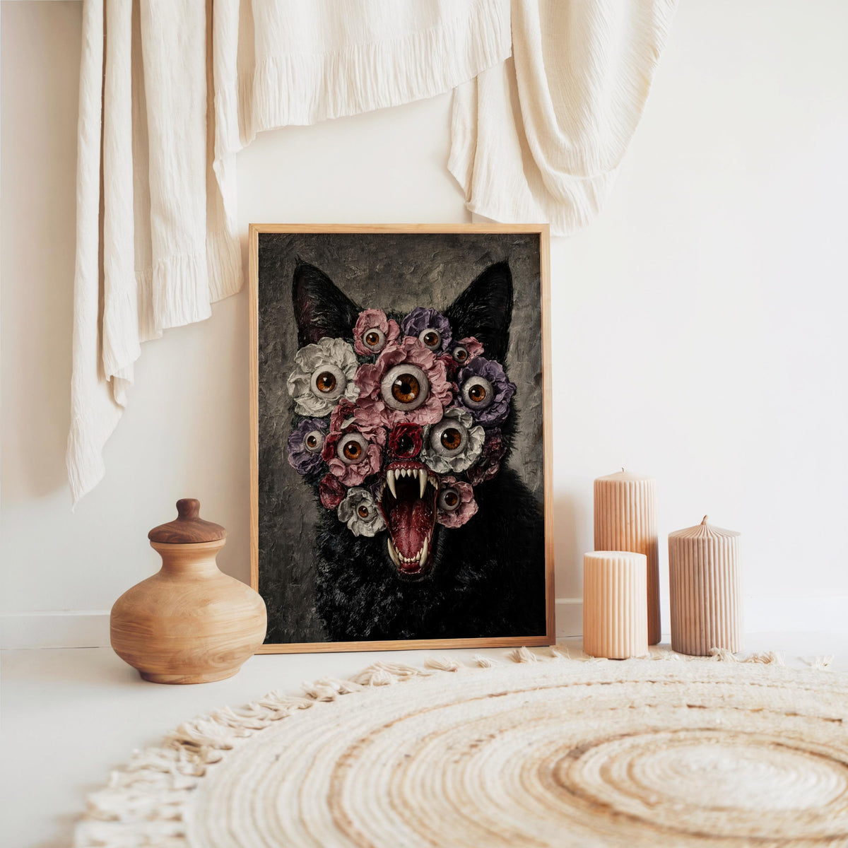 Horror-inspired home decor print set on floor near woven rug and pottery, moody black cat floral wall art scene