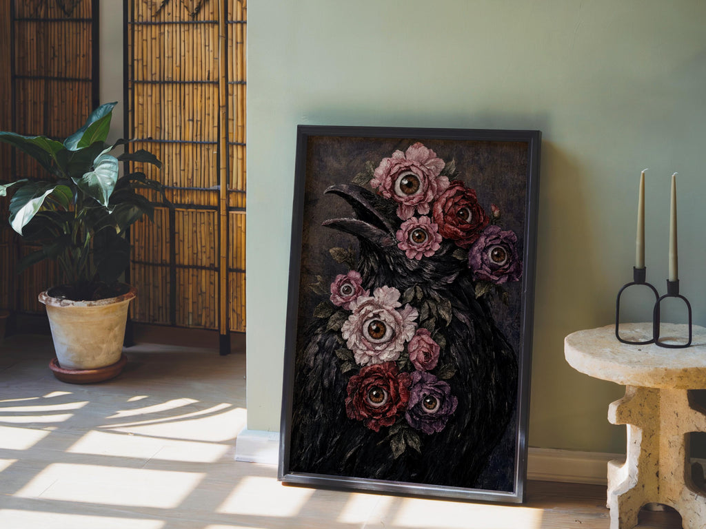 Framed surreal raven art print propped by a potted plant, dramatic shadows, gothic raven print vibe