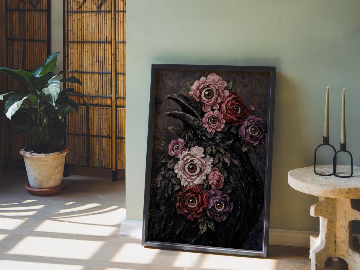 Framed surreal raven art print propped by a potted plant, dramatic shadows, gothic raven print vibe