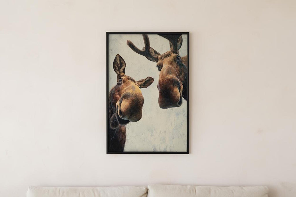 Centered moose print hung over a sofa, statement whimsical moose art with neutral backdrop, funny moose wall art printable
