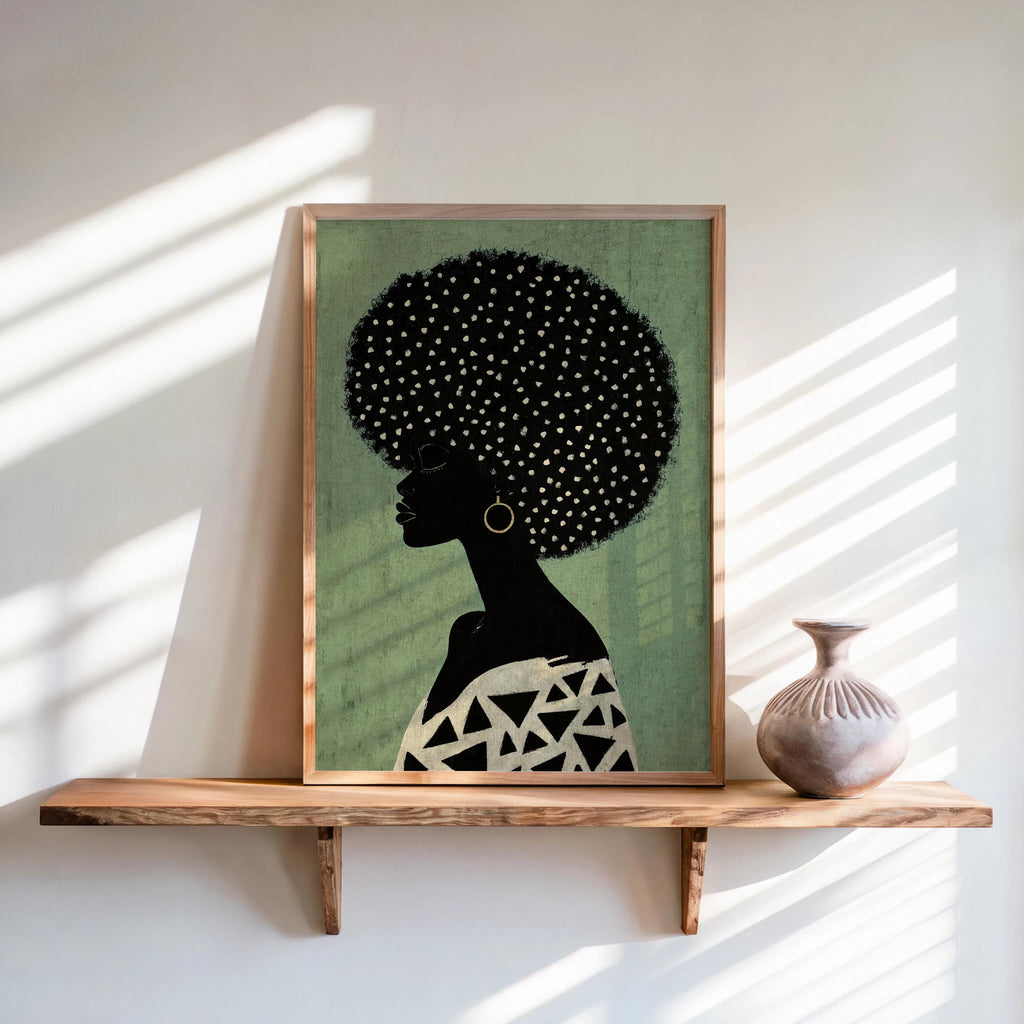 Sage green background print resting on a shelf, minimalist Black woman profile with patterned top, Afrocentric Black woman wall art