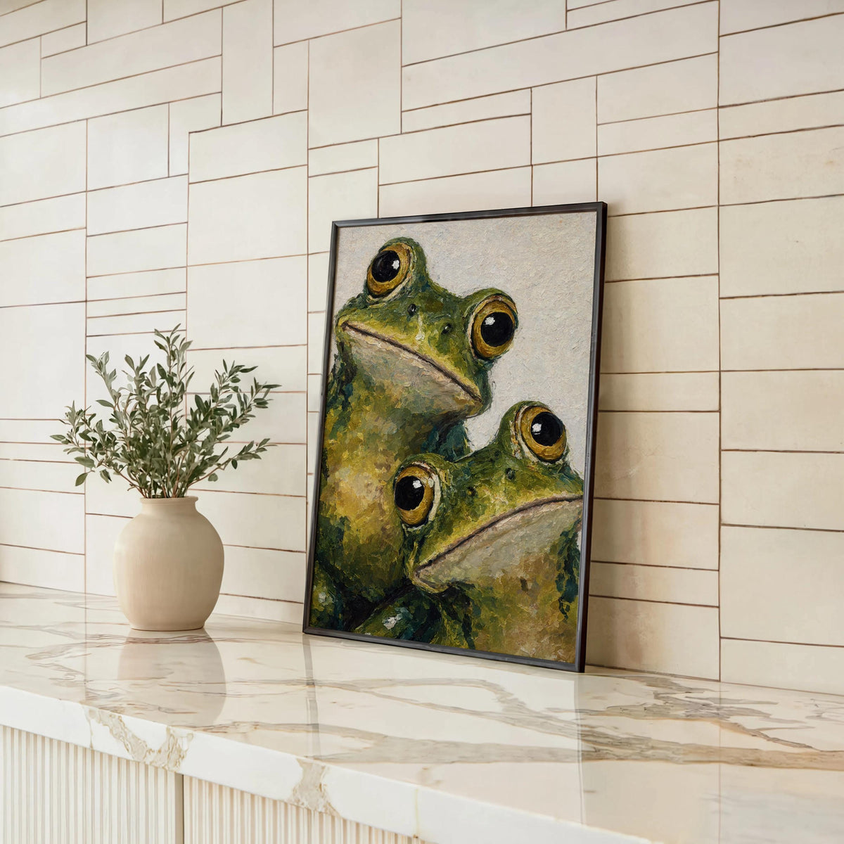 Cottagecore frog art leaning against pale tiled wall, small plant, earthy greens and painterly texture.