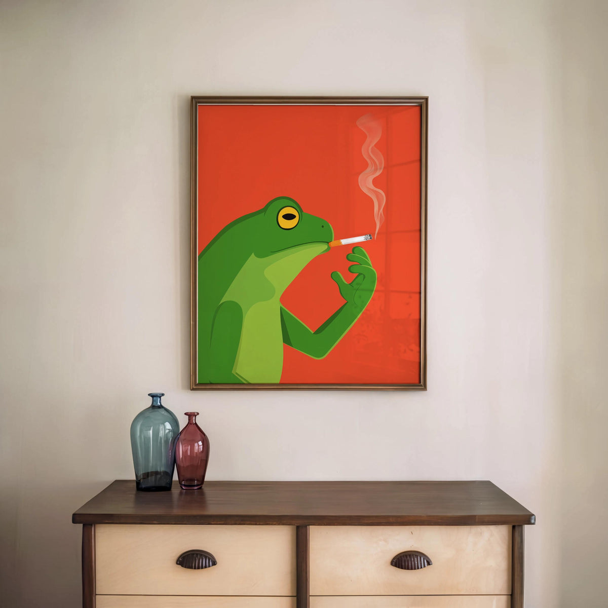 Framed funny frog wall art print above wooden console, mid century modern animal print with orange backdrop