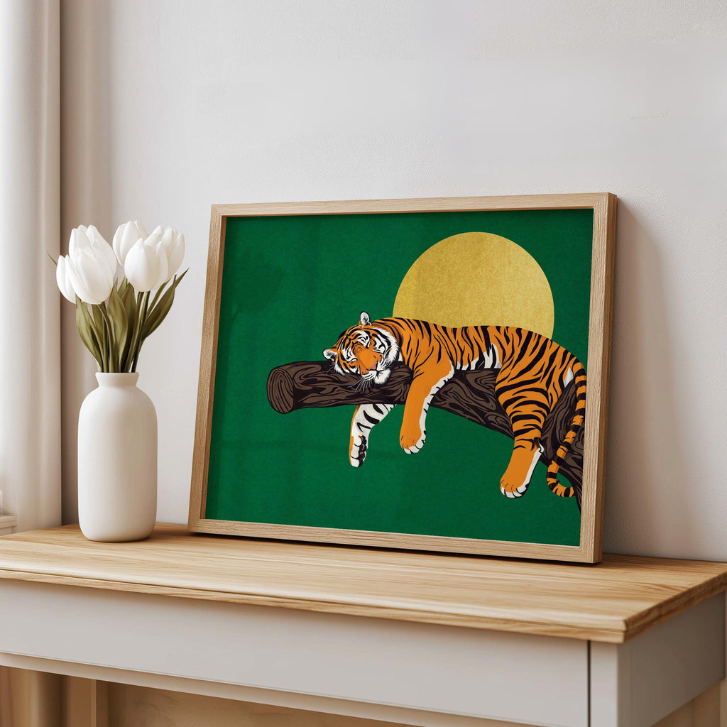 Green sleeping tiger wall art above shelf with vase, bold moon, mid century animal art influence