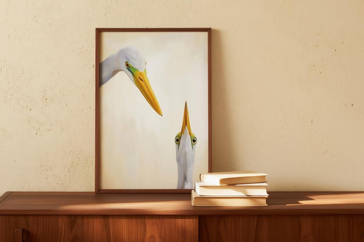 Tall frame centered on console, two white herons in cream tones, egret wall art printable in a modern setting